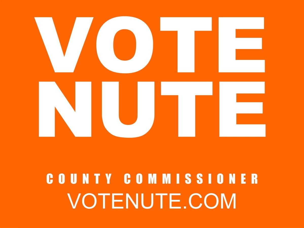 Orange Vote Nute County Commissioner yard sign